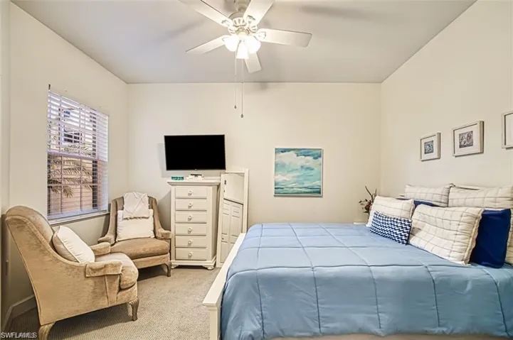 Bedroom featuring carpet flooring and ceiling fan