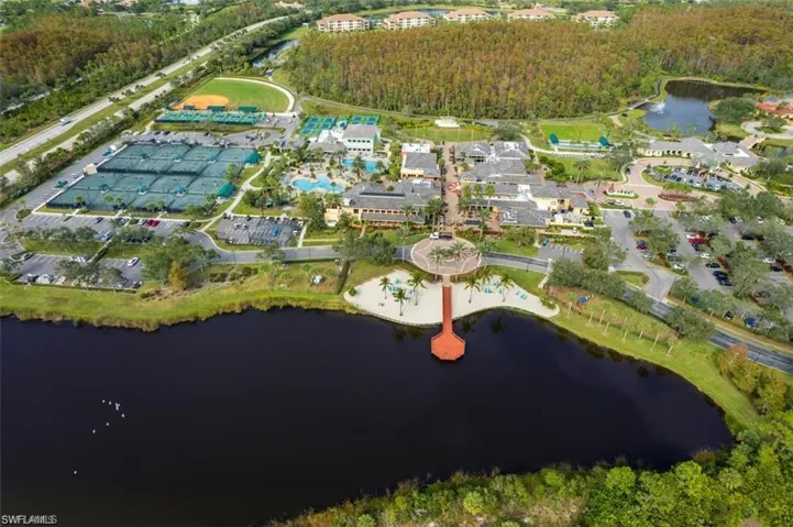 Aerial view of property's location with a nearby body of water