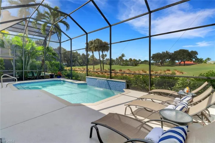 Relax on your large pool deck with Pool and Waterfall feature.