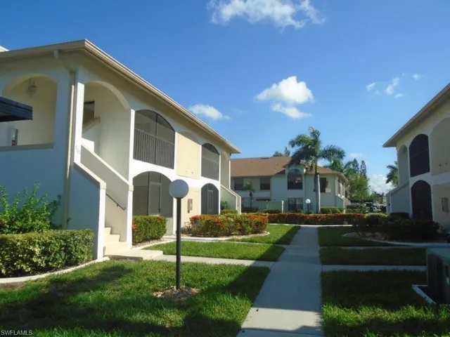 View of home's community featuring a yard