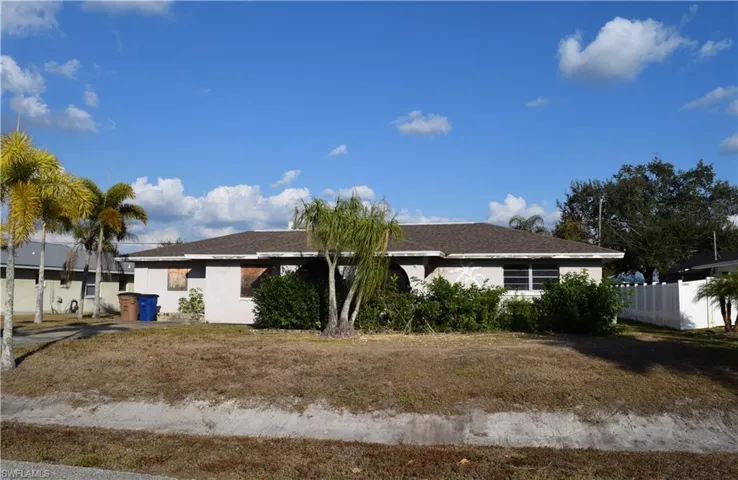 Single story home with stucco siding