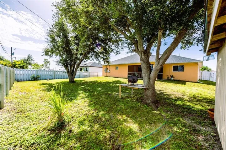 View of fenced backyard