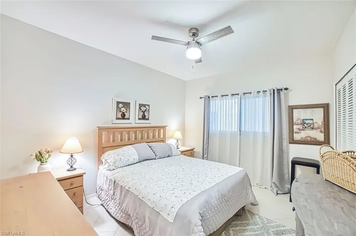 Bedroom featuring ceiling fan and light tile patterned floors