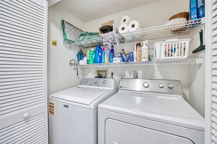 Laundry area featuring separate washer and dryer