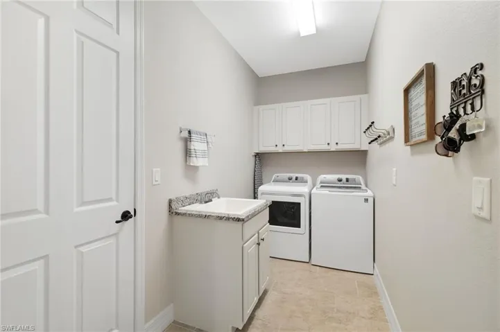 Large Laundry with Added Cabinets