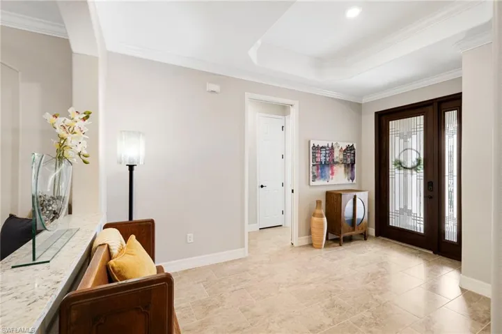 Welcoming Foyer with Glass Insert Door