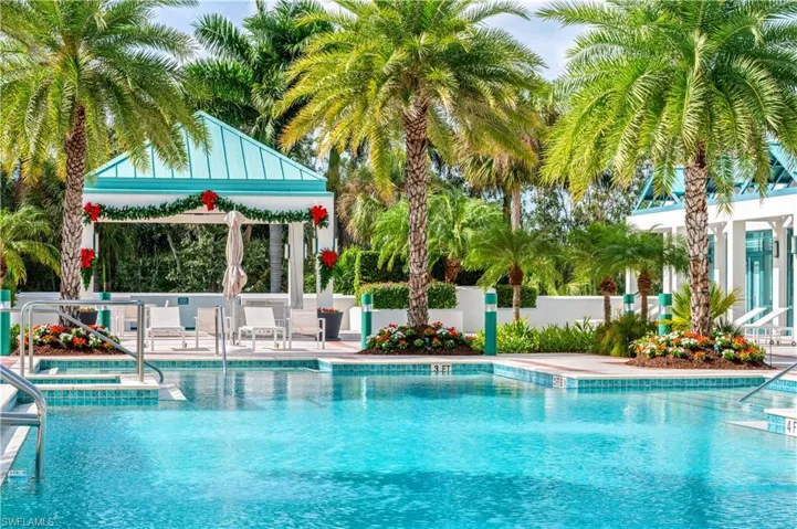 Community pool featuring a patio area and a gazebo