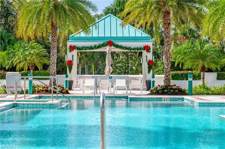Community pool with a patio and a gazebo