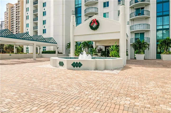 View of front of the high rise building's entry