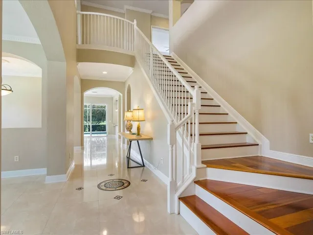 Extra wide staircase off foyer...