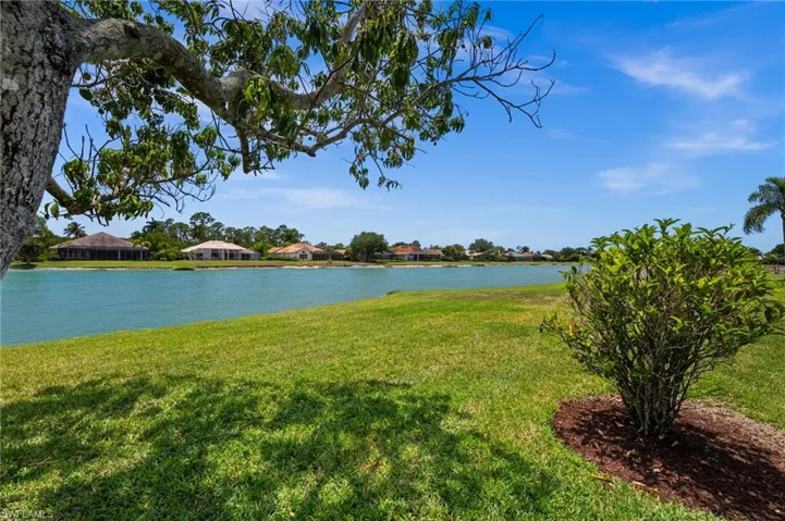 Beautifully maintained grounds overlooking tranquil lake