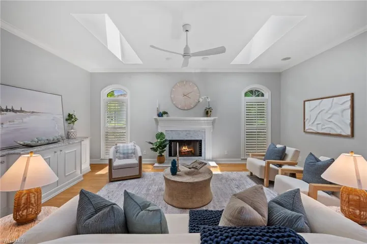 Spacious family room with volume ceilings and abundant natural light