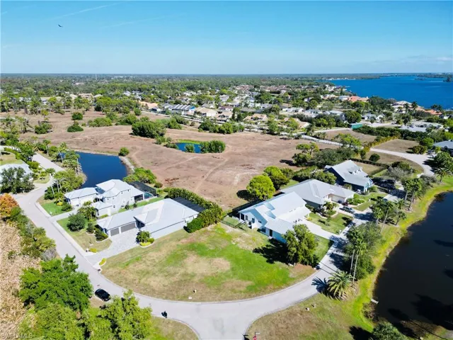 Aerial view of residential area with a nearby body of water