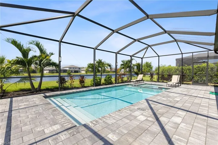View of pool featuring a lanai and a patio