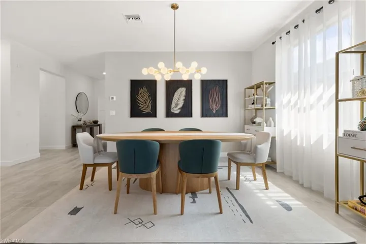 Dining area featuring a chandelier