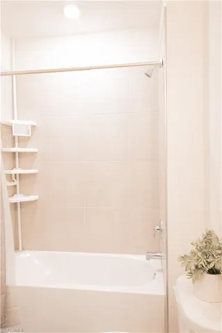 Bathroom featuring shower / bathtub combination