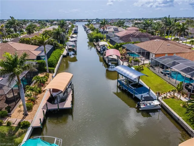 Aerial view of residential area with a large body of water