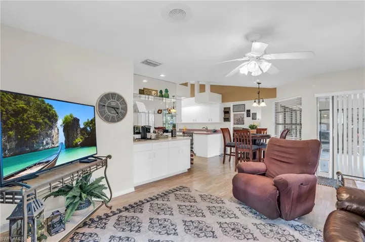 Living room opens up to open breakfast area and kitchen