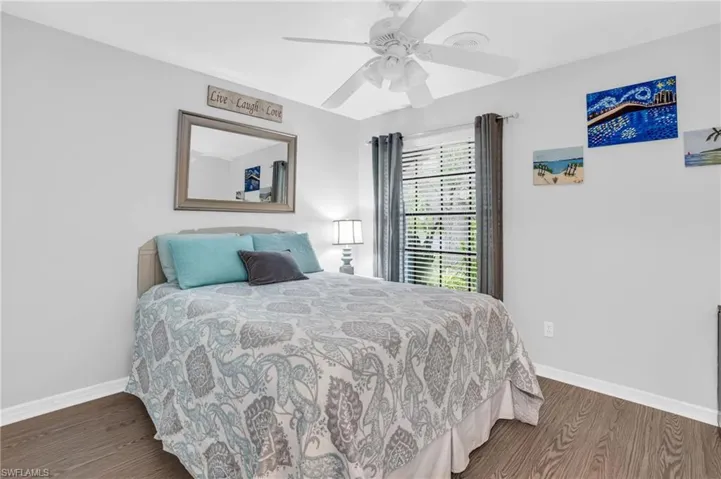Second Bedroom w/ luxury vinyl plank floor and nice sized closet