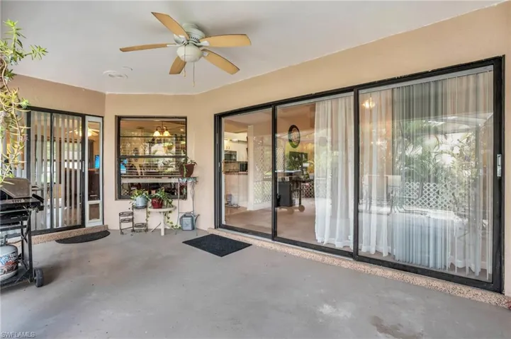 Over-sized lanai with three sliders and one window for plenty of natural light inside the home