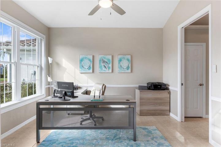 Den with french door and pocket door for privacy.