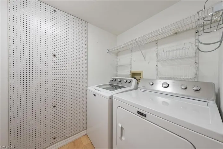 In residence Laundry area with separate washer and dryer