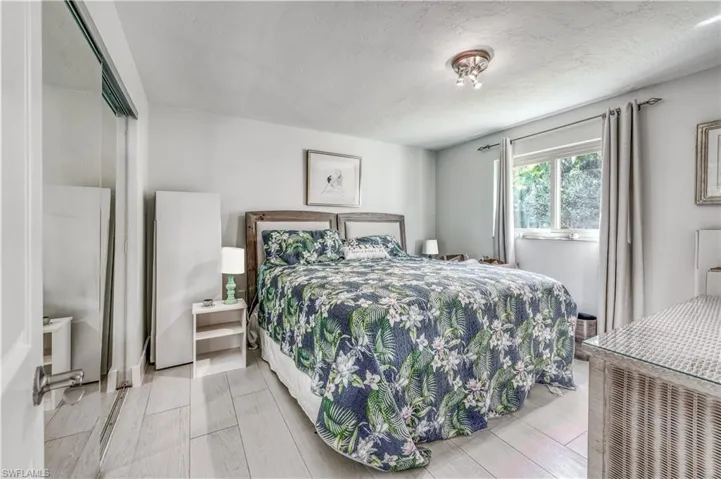 Bedroom featuring a textured ceiling