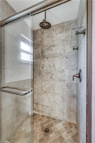 Bathroom featuring a shower stall