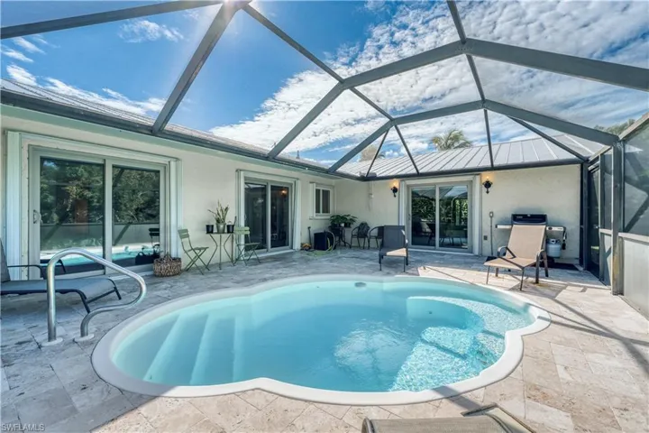 Pool featuring a patio area and a lanai