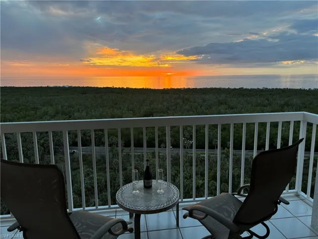 Balcony at dusk with a water view