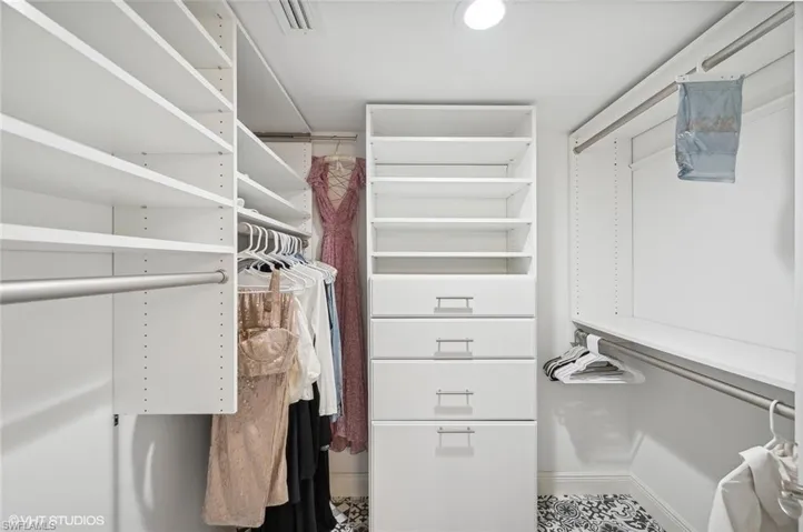 View of spacious prrimary bedroom  closet