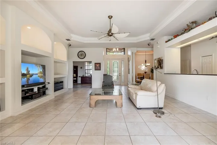 Open floor plan with great room and built-in shelving.