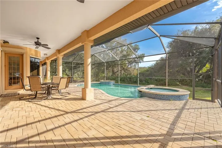 Heated pool/spa with huge screened lanai and pocket sliding glass doors leading to this oasis.