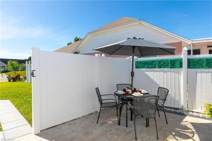 View of patio featuring outdoor dining area