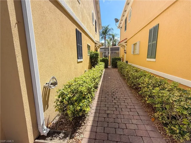 View of property exterior with stucco siding