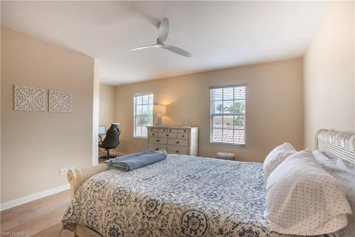 Bedroom with light wood-type flooring and ceiling fan