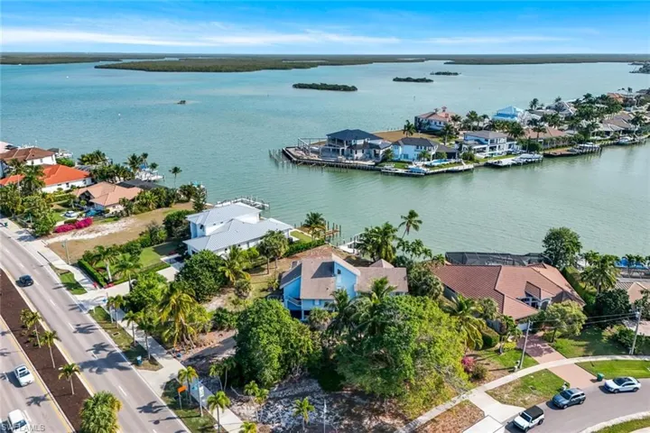 Aerial view of residential area with a nearby body of water