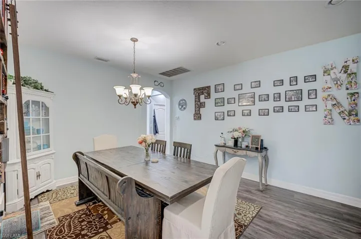 Luxury Vinyl Flooring.  5 1/4 baseboards.