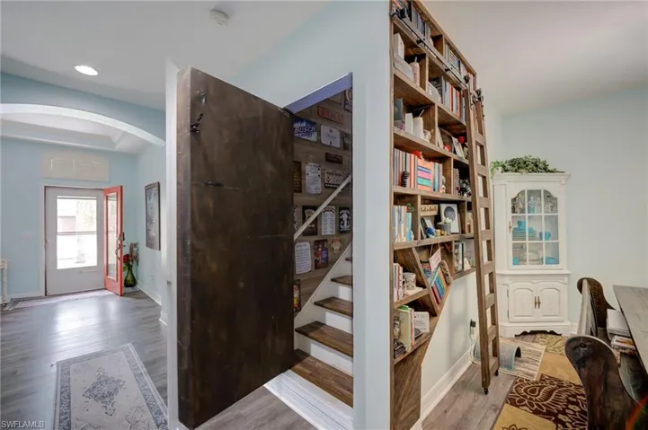 Holy Batman!  It's the entrance to a "Man Cave", additional Bedroom, Media Room, Hobby/Craft Room, or an Office. . .you name it.