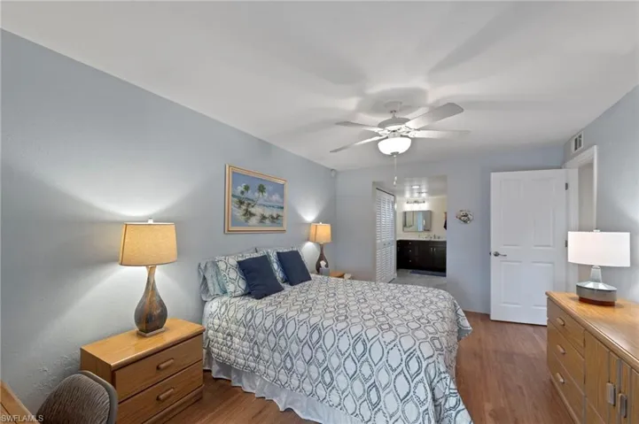Primary bedroom with walk-in closet, (attic access with ladder) and 2nd closet.