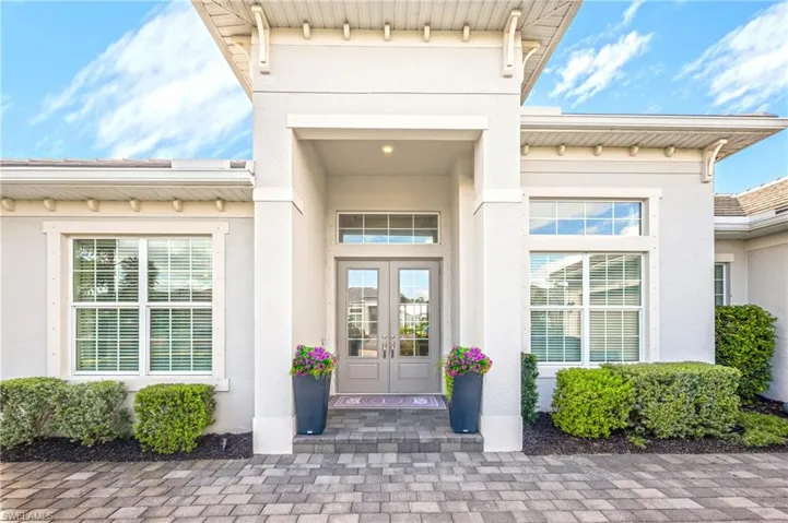 Property entrance with french doors