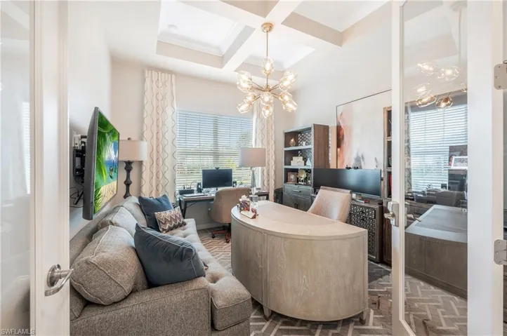 Office/Bedroom featuring a chandelier, beamed ceiling, ornamental molding, and coffered ceiling