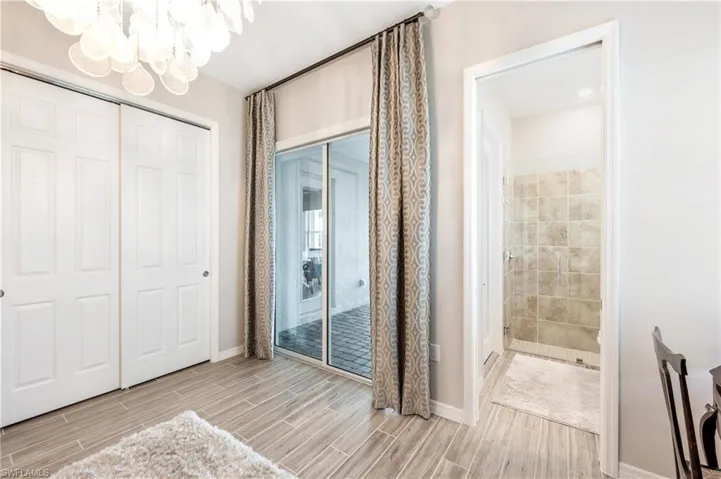 Bedroom with access to pool