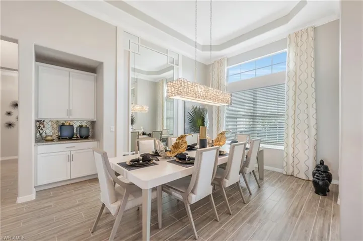 Look at accent mirrored wall, fixture and cabinetry