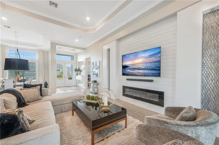 Timeless and sophisticated this custom fireplace creates a wow worthy wall with custom lighting features.