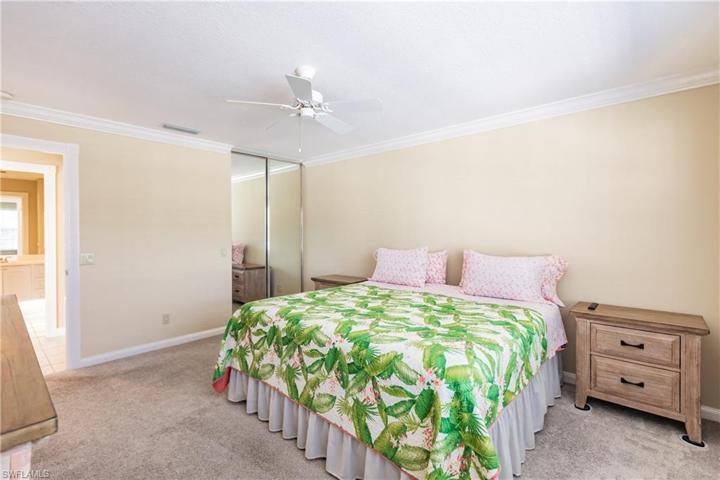 Spacious master bedroom fits large furniture pieces.