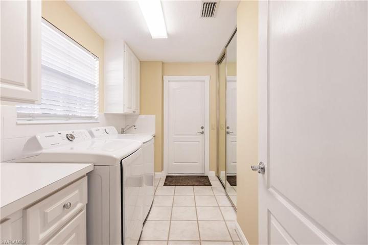 You will love the storage space in this laundryroom.
