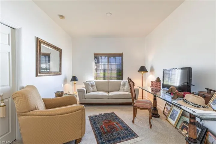 Living room featuring carpet
