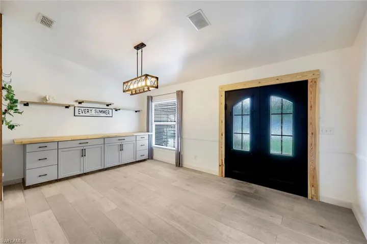 Notice the hard wood flooring throughout.