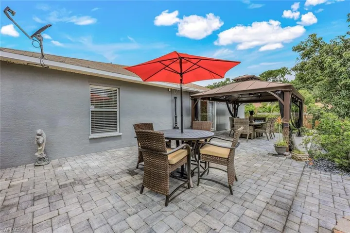 So much covered outdoor space! Notice the hurricane resistant pergola.